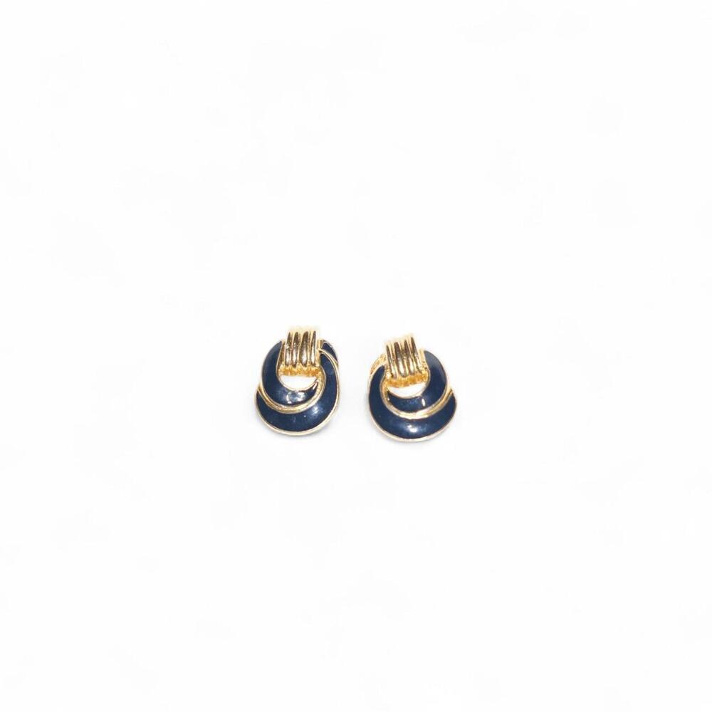 elegant vintage earrings featuring rich blue enamel on a gold tone base